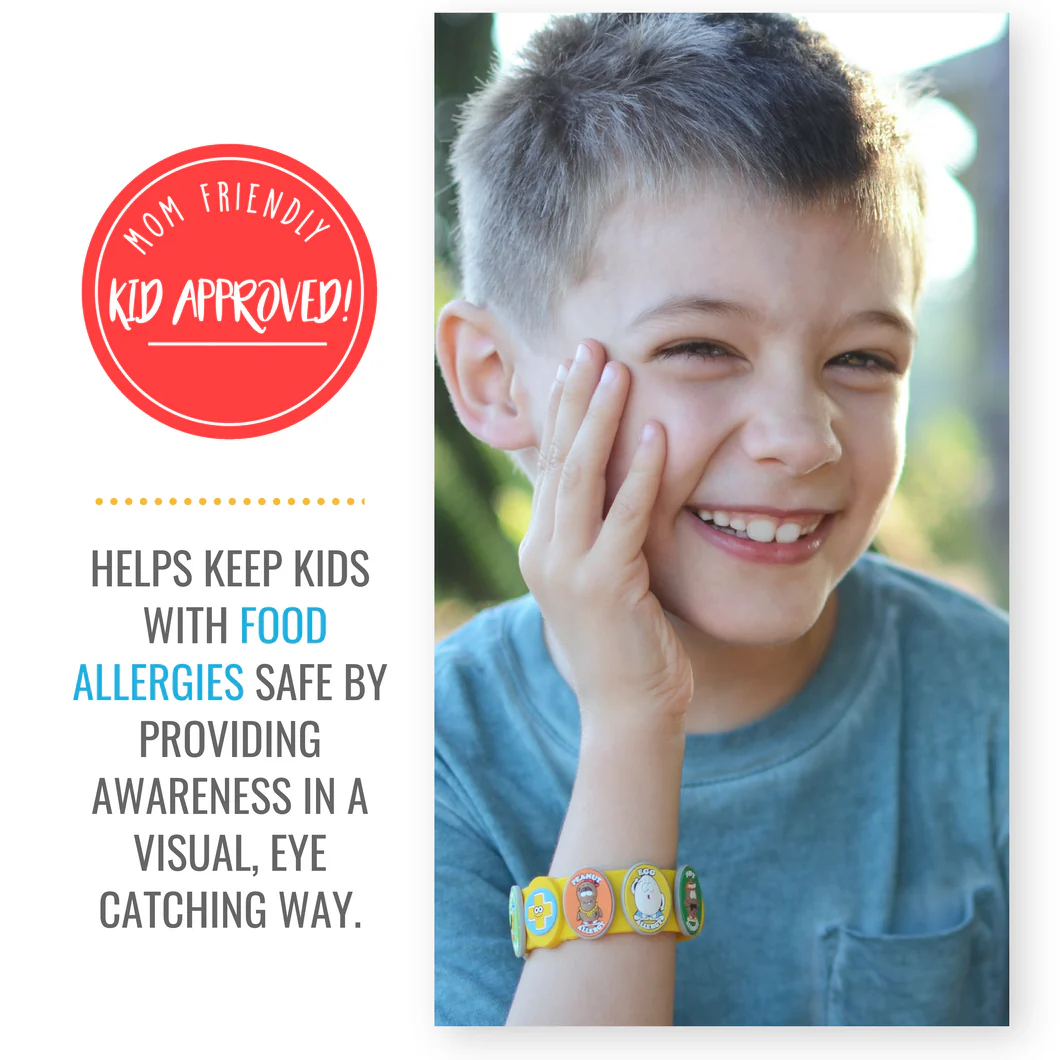 Smiling boy wearing a colorful multi-food allergy awareness bracelet on his wrist.