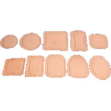 Assorted hydrocolloid wafers in various shapes and sizes for wound or stoma care