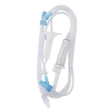 Clear medical IV tubing set with connectors and drip chamber on white background
