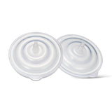 Clear plastic backflow protectors for breast pump accessories on white background