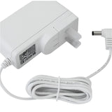 White medical device power adapter with coiled cable and standard DC plug