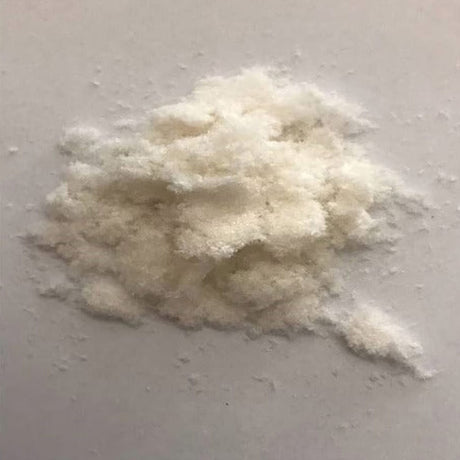 White medical powder for home health care on a plain surface