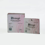 Box and packet of sterile Protegé petrolatum gauze strips for wound care, 1x8 inch size.