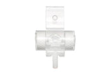 Transparent medical tube connector with textured grips, used for home healthcare supplies