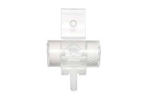 Transparent medical tube connector with textured grips, used for home healthcare supplies