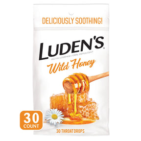 Luden's Wild Honey flavored throat drops bag, 30 count, with honey dipper, honeycomb, and chamomile flower on packaging.