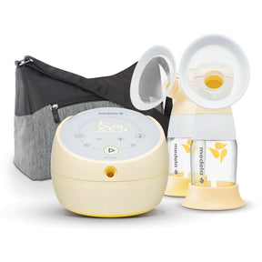 Electric breast pump set with bottles, breast shields, and a carrying bag on white background