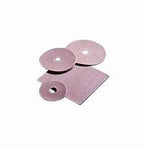 Round and square medical adhesive pads in pink on white background