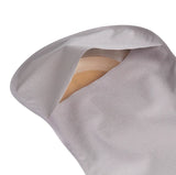 Close-up of a discreet beige ostomy pouch with a soft fabric cover