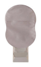 Beige ostomy bag with filter, closed pouch, medical supply on white background