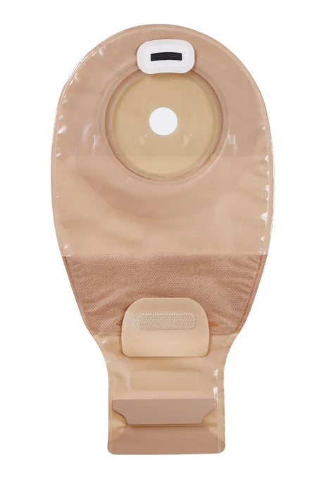 Beige ostomy bag with adhesive barrier, drainage opening and closure for medical use