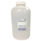 Large plastic bottle of USP sterile water for medical use on white background