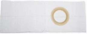 White medical ostomy barrier with central adhesive ring on a plain background