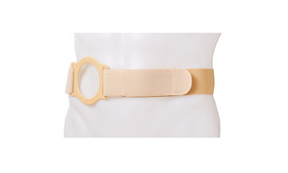 Beige ostomy support belt with adjustable strap on torso mannequin