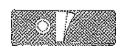 Illustration of a rectangular medical device with circular and angular elements, black and white