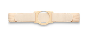 Beige medical ostomy belt with adjustable straps and central circular opening