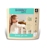 Baby smiling near crib on eco-friendly overnight diapers packaging, size 4 for sensitive skin