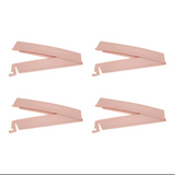 Set of four pink medical supply clips on a white background