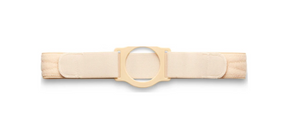 Beige medical support belt with adjustable straps and central circular opening
