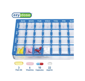 Weekly pill organizer with assorted vitamins, capsules, fish oil, and aspirin.