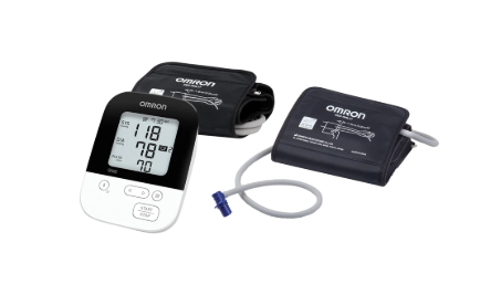 Digital blood pressure monitor with two arm cuffs for home health monitoring