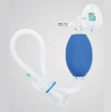 Manual resuscitator bag with clear mask and blue squeeze bulb for emergency respiratory support