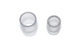 Two clear plastic medical tube adapters on a white background