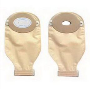 Two beige ostomy pouches with adhesive flanges, shown from front and back, on white background.