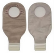 Pair of beige ostomy bags with circular openings and adhesive closures for medical use
