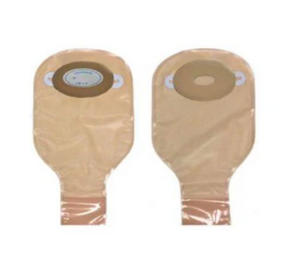 Two beige ostomy bags with adhesive baseplates on a white background, medical supplies.