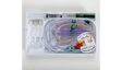 Medical catheter kit with tubing, syringe, and securement device in plastic tray