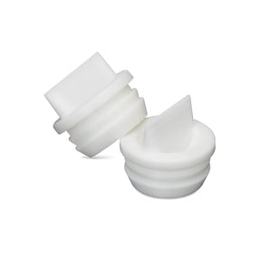 White medical-grade plastic replacement valves for medical devices, isolated on white background