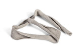 Sterile wound packing strip dressing on white background, medical gauze for wound care.