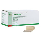 Elastic medical bandage roll next to a white Lenkelast box, wound care supply
