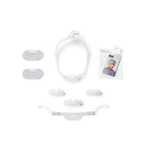 Nasal CPAP mask kit with headgear, cushion inserts, and instruction manual for sleep apnea
