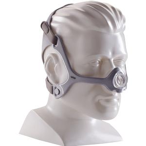 Nasal CPAP mask with headgear for sleep apnea shown on mannequin head