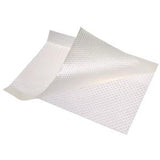 Non-adhesive medical dressing pad with textured, transparent surface on white background