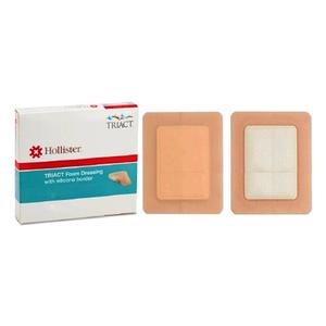 Foam wound dressings with adhesive border next to product box for medical supplies