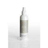 Esenta medical adhesive remover spray bottle with cap on white background