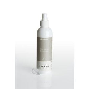 Esenta medical adhesive remover spray bottle with cap on white background