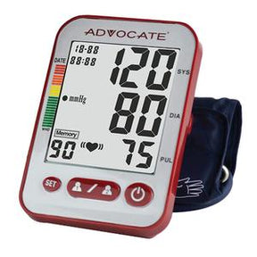 Digital blood pressure monitor with cuff, displaying readings on LCD screen