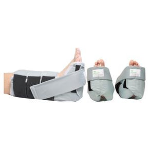 Gray medical foot and heel protectors on patient feet for pressure relief