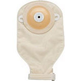 Beige ostomy pouch with integrated adhesive barrier for medical use, isolated on white background