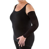 Woman wearing a black compression arm sleeve for lymphedema support