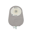 Grey medical ostomy pouch with adhesive barrier and drainable outlet on white background