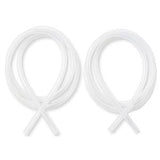 Two coiled clear medical tubing sets on a white background, home medical supplies