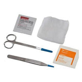 Sterile wound care kit with scissors, forceps, gauze, and medical pads on white background