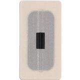Medical adhesive patch with sensor on white background, essential medical supply