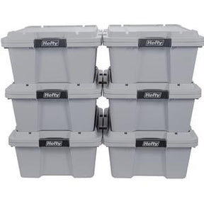 Stack of six gray plastic storage bins with secure lids for organizing and storing supplies