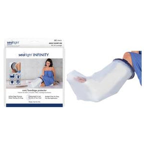 Adult woman using a cast or bandage protector sleeve for arm while sitting on bed